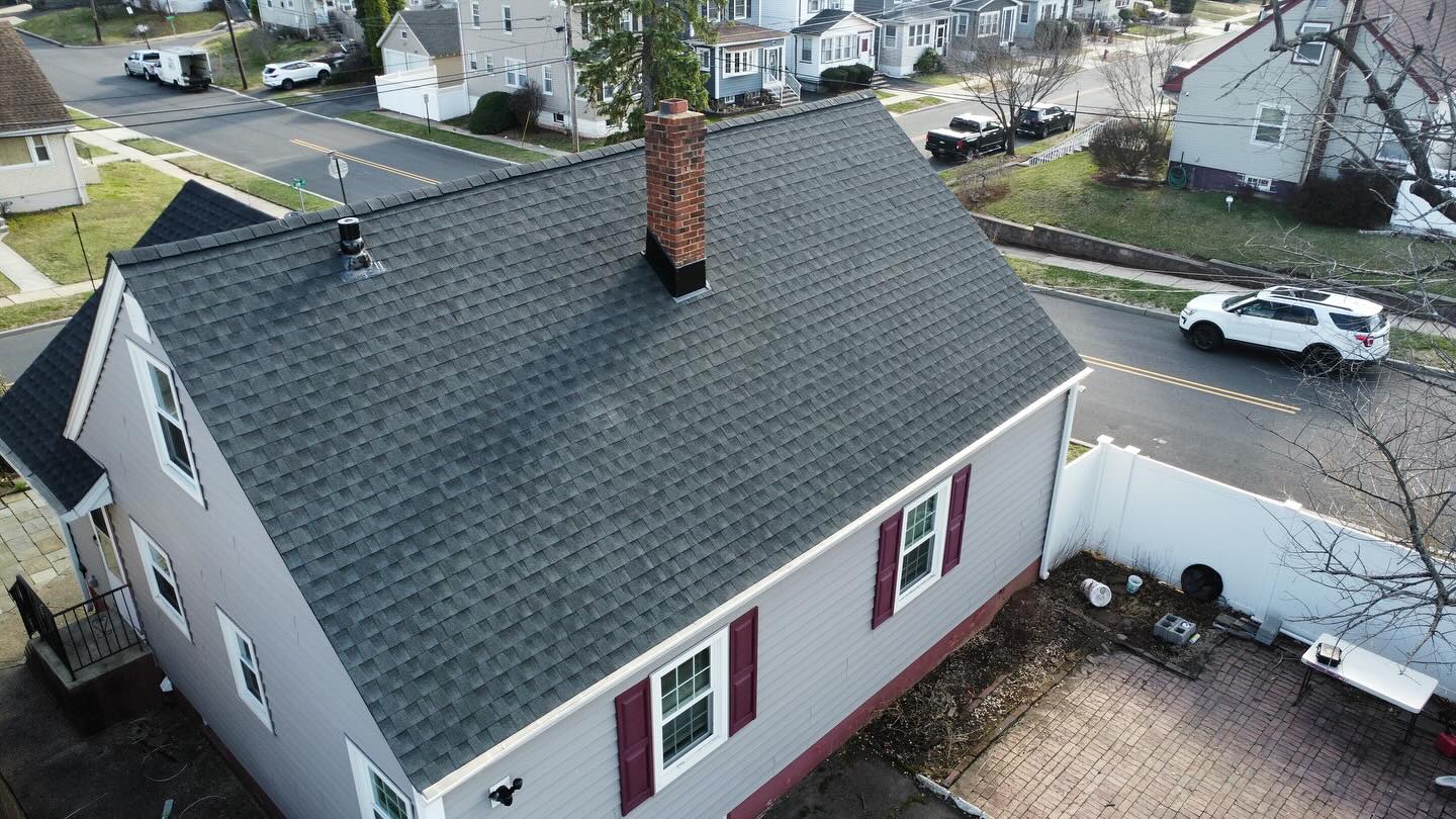 Angled view of completed GAF Timberline HDZ roof in Roselle, NJ