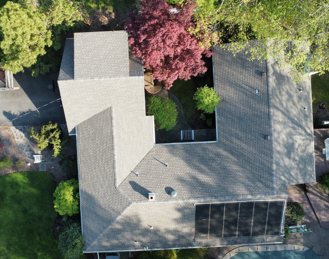Roof replacement after — solar panels maintained