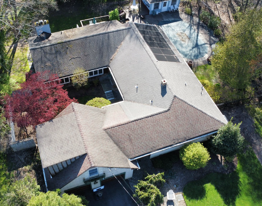 Roof replacement with solar panels — alternate view